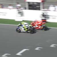 Qatar- Stoner just about to take Rossi on main straght