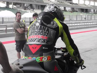 Rossi heads out in pit lane at Sepang test