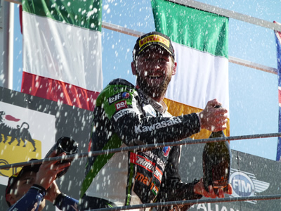 Tom Sykes celebrates a win in Monza