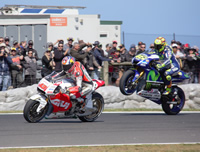 Rossi wheelies over local hero Jack 