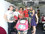 Ant West with team experienece guests at Sepang