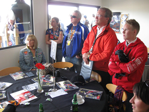 Danny Webb, Gordon Howell and customers watch the dramatic Moto2 race unfold. Go, Scott, Go!