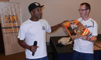 Danny helps auction items for charity