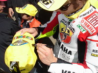 Rossi gets a hand in